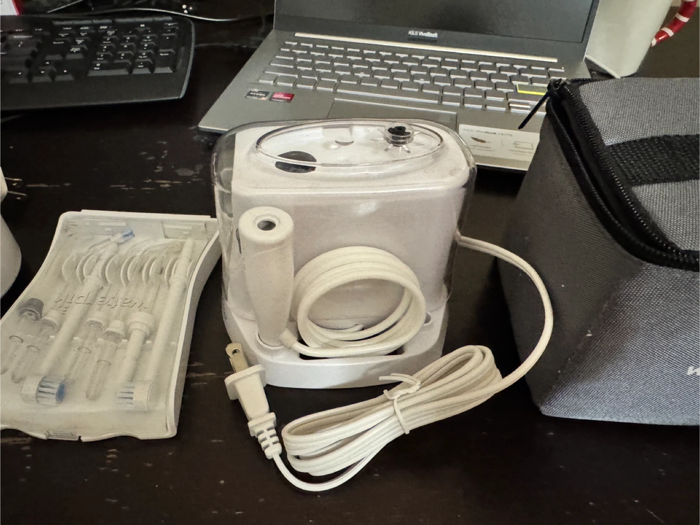 Waterpik Water Flosser with Travel Case and Multiple Tips - photo 4