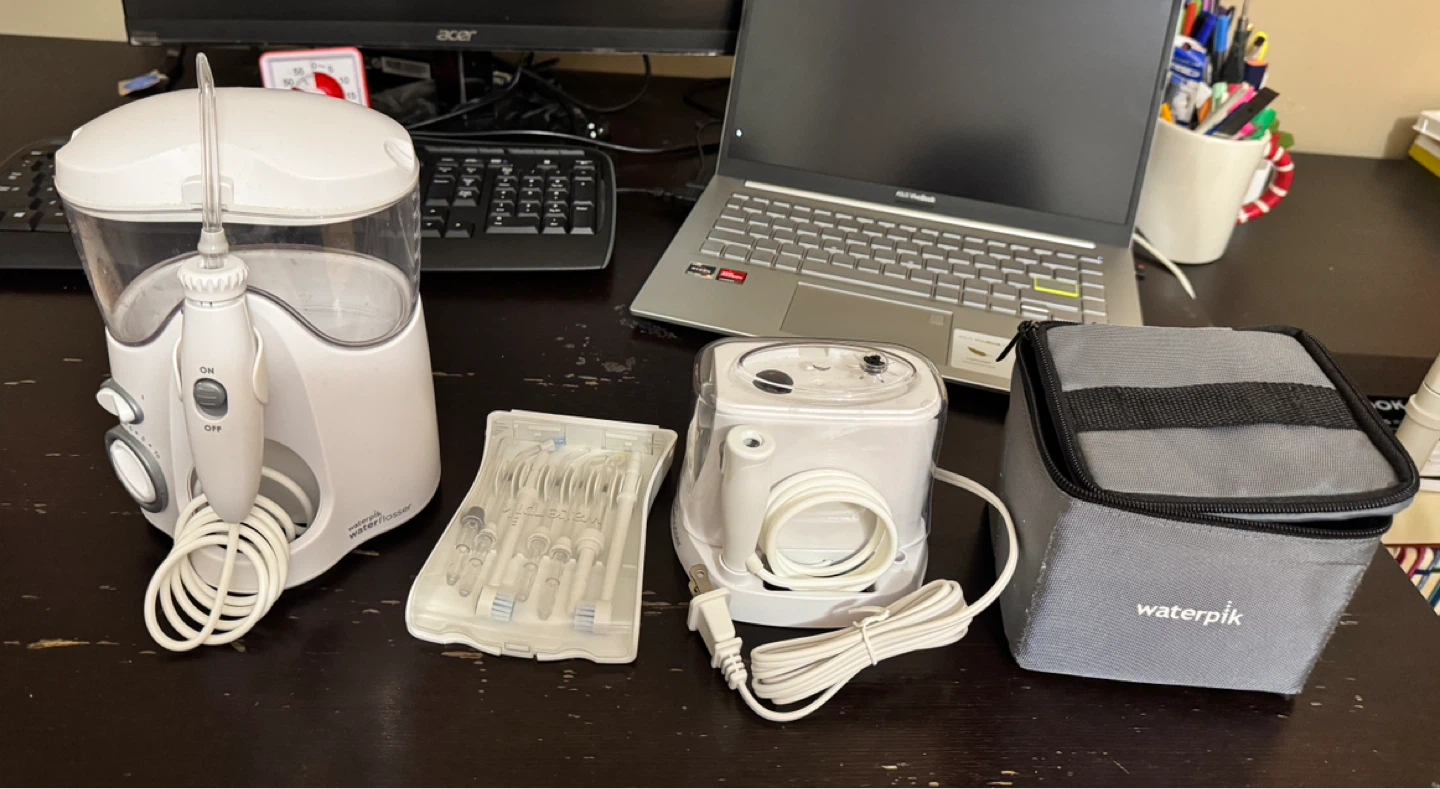 Waterpik Water Flosser with Travel Case and Multiple Tips