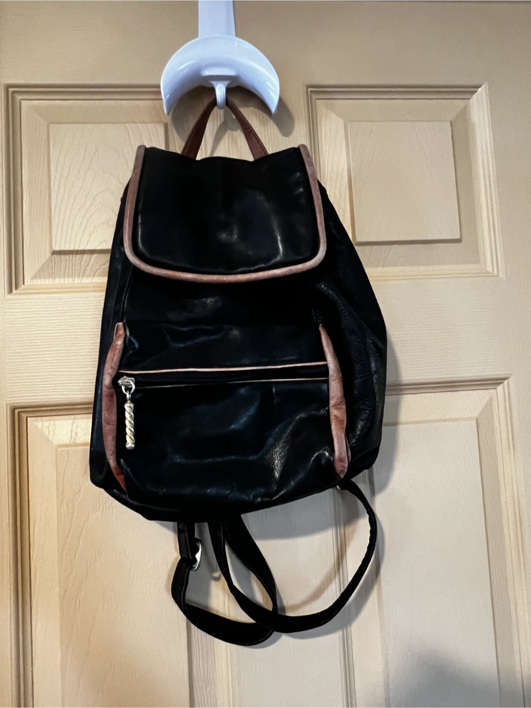 Black Leather Backpack Purse with Brown Accents