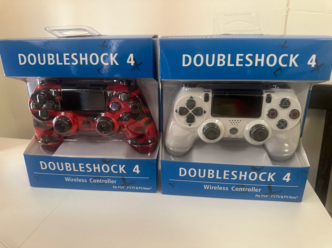2 DoubleShock 4 Wireless Controllers - Red Camo & White