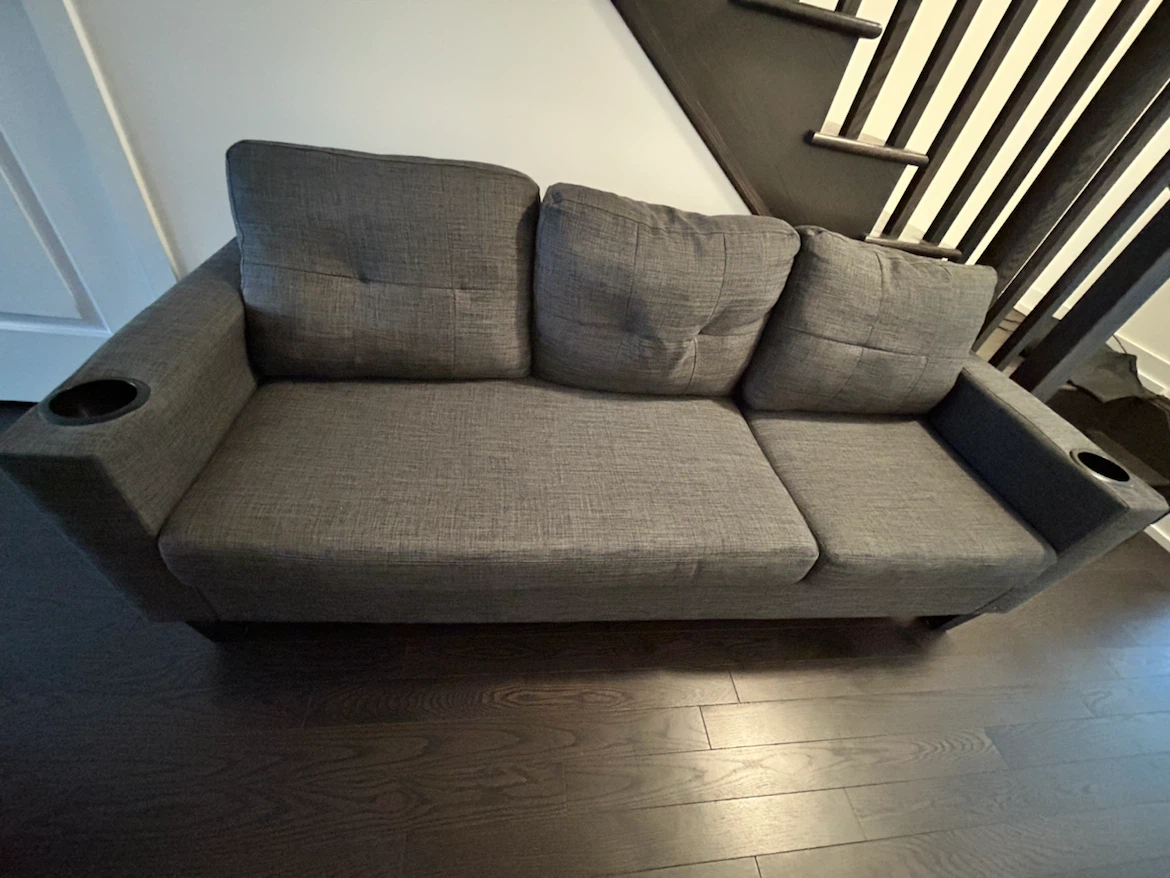 Grey sofa with cup holders