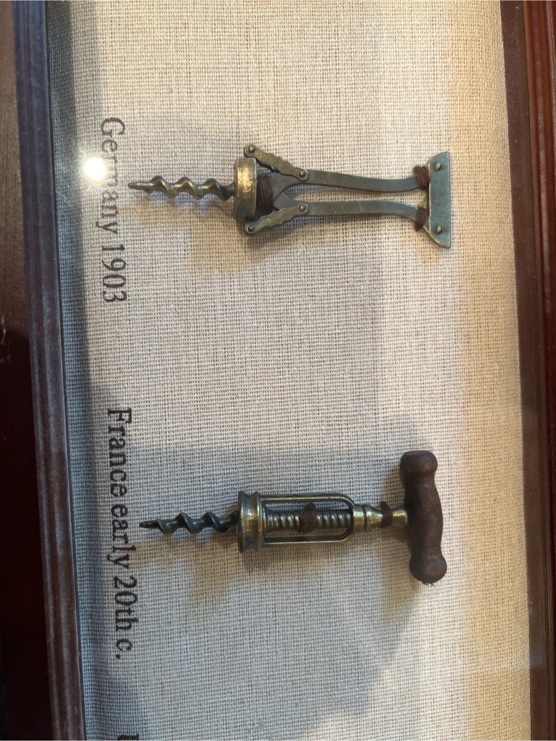 Picture with vintage cork screws - photo 2