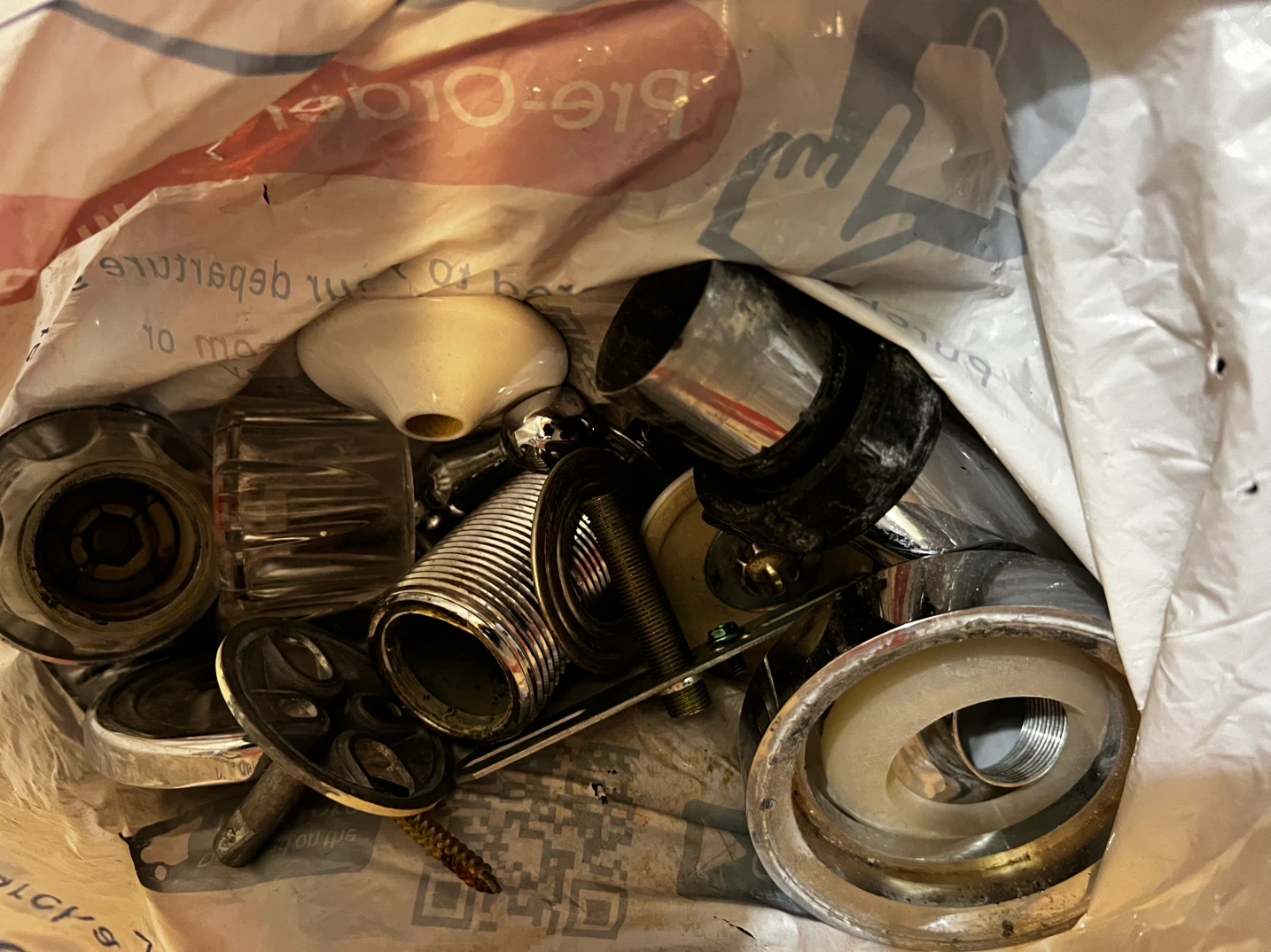 Bag of assorted plumbing parts