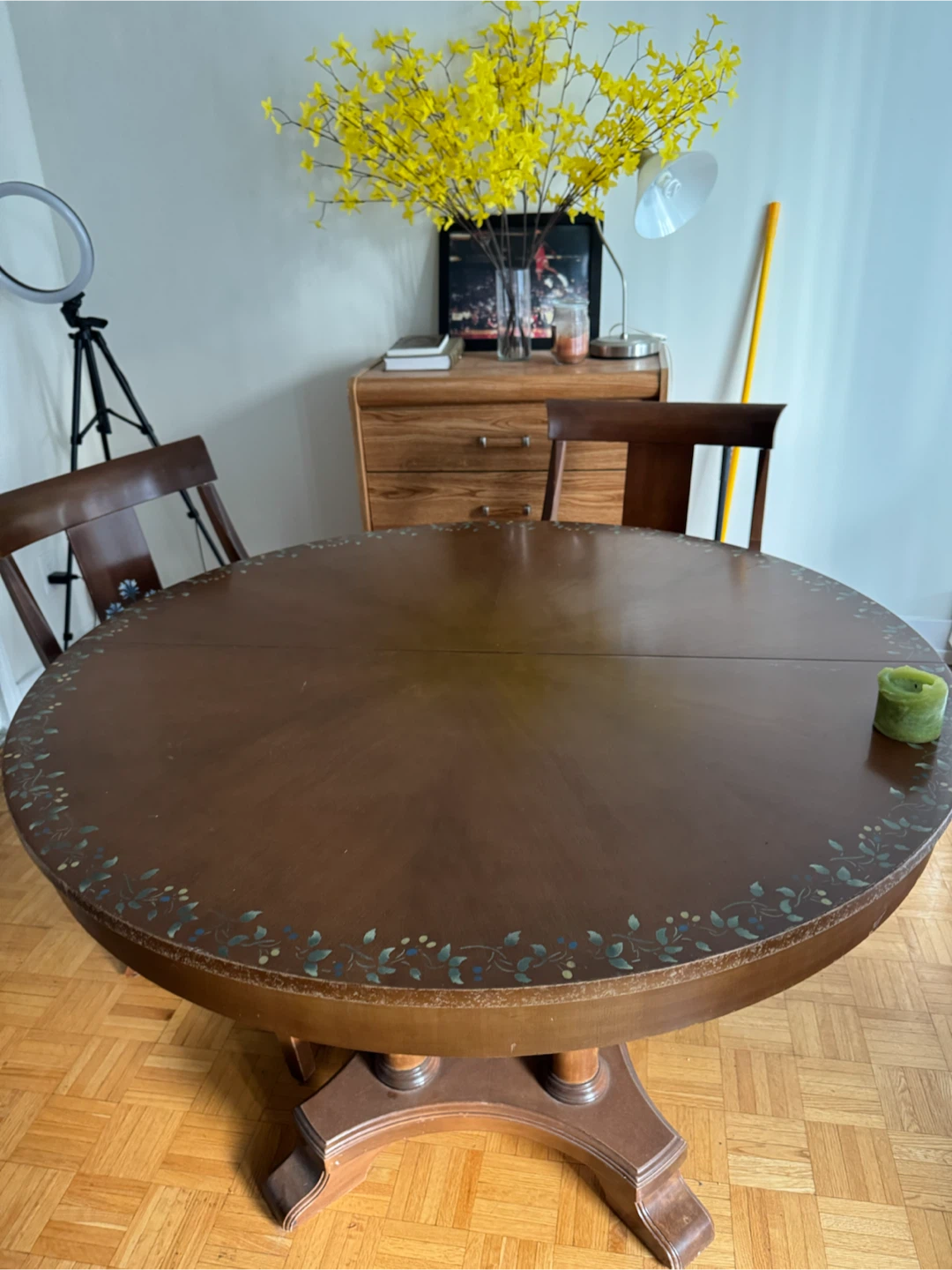 Round Dining Table with Floral Accent
