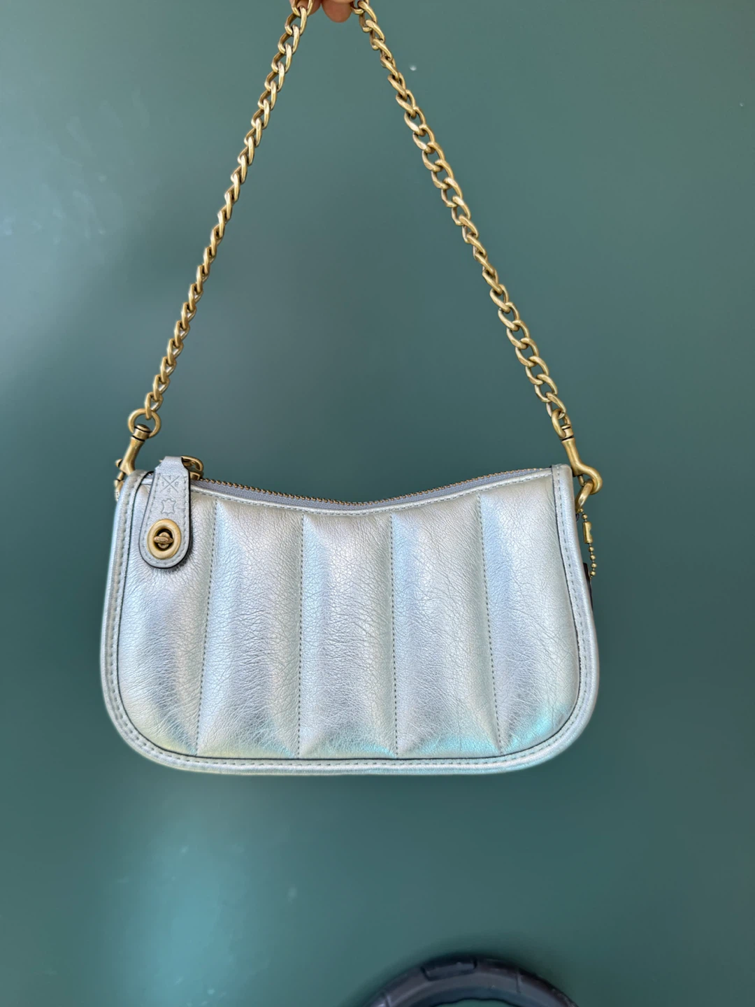 Coach swinger 20 metallic leather clutch