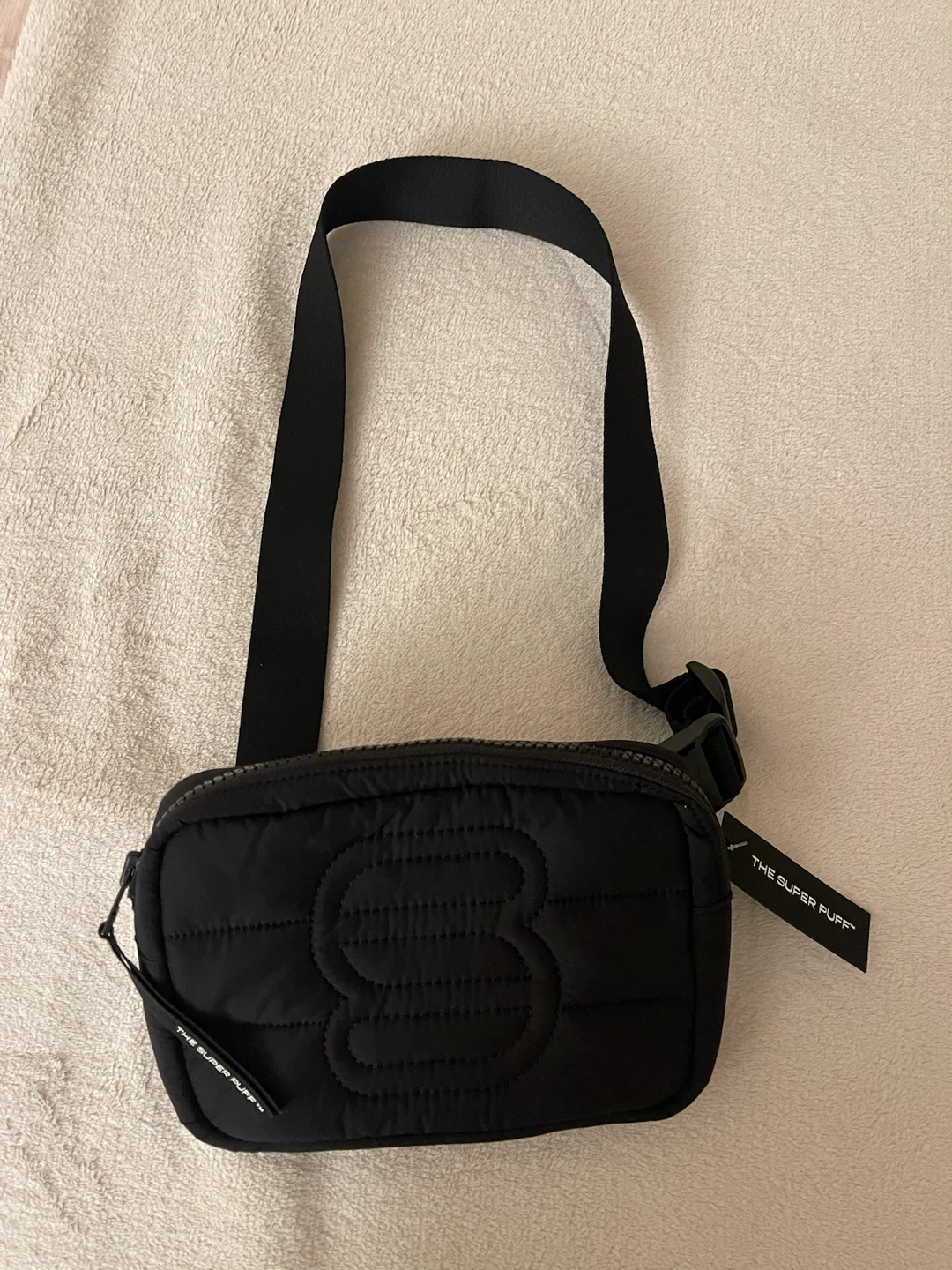 aritzia the super puff bag