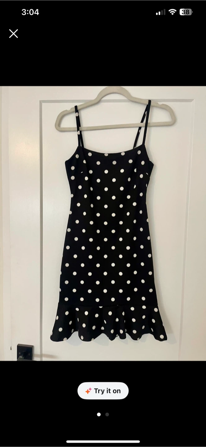 Black polka dot mini dress