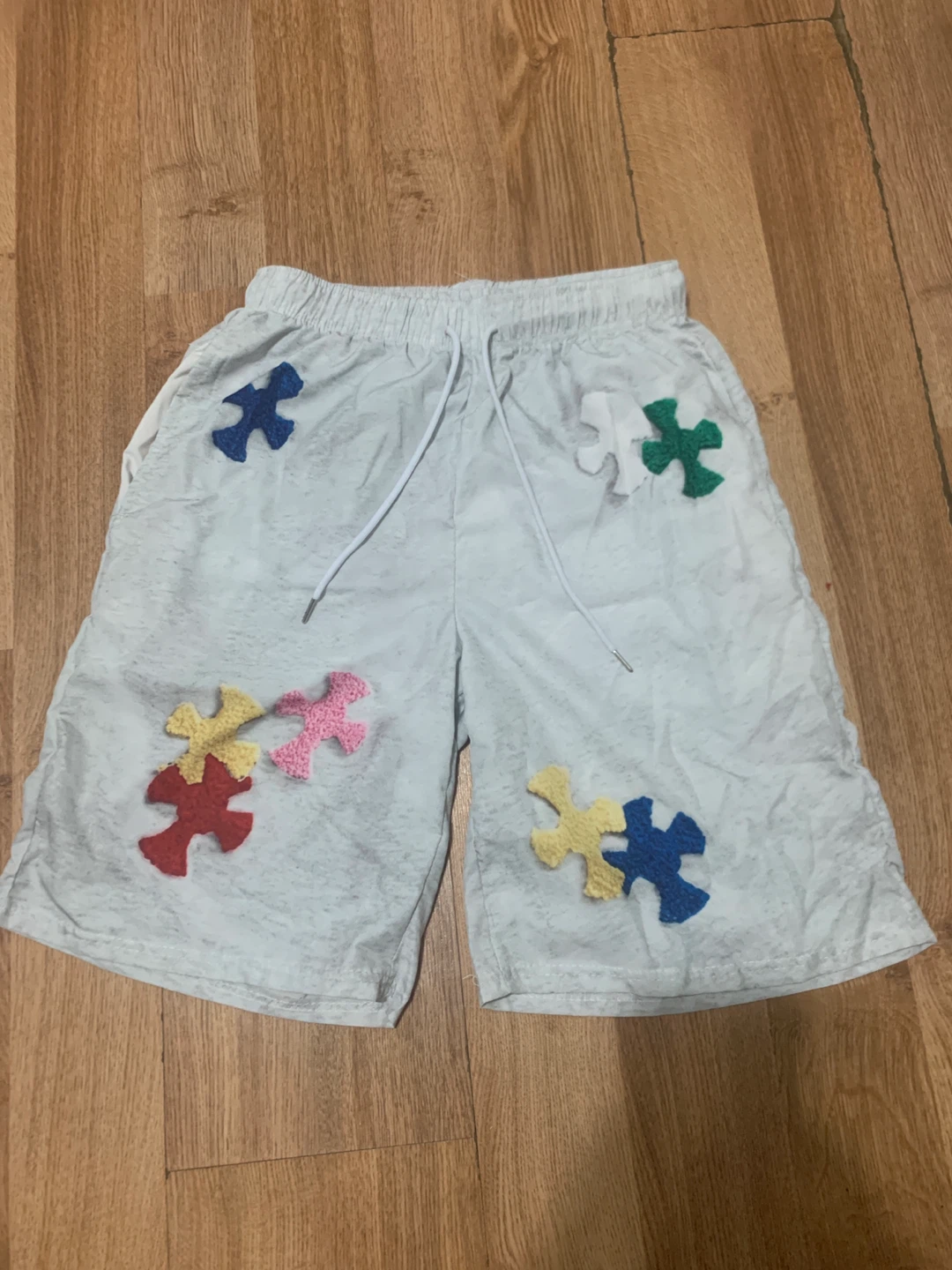 White Shorts with Puzzle Piece Appliqués