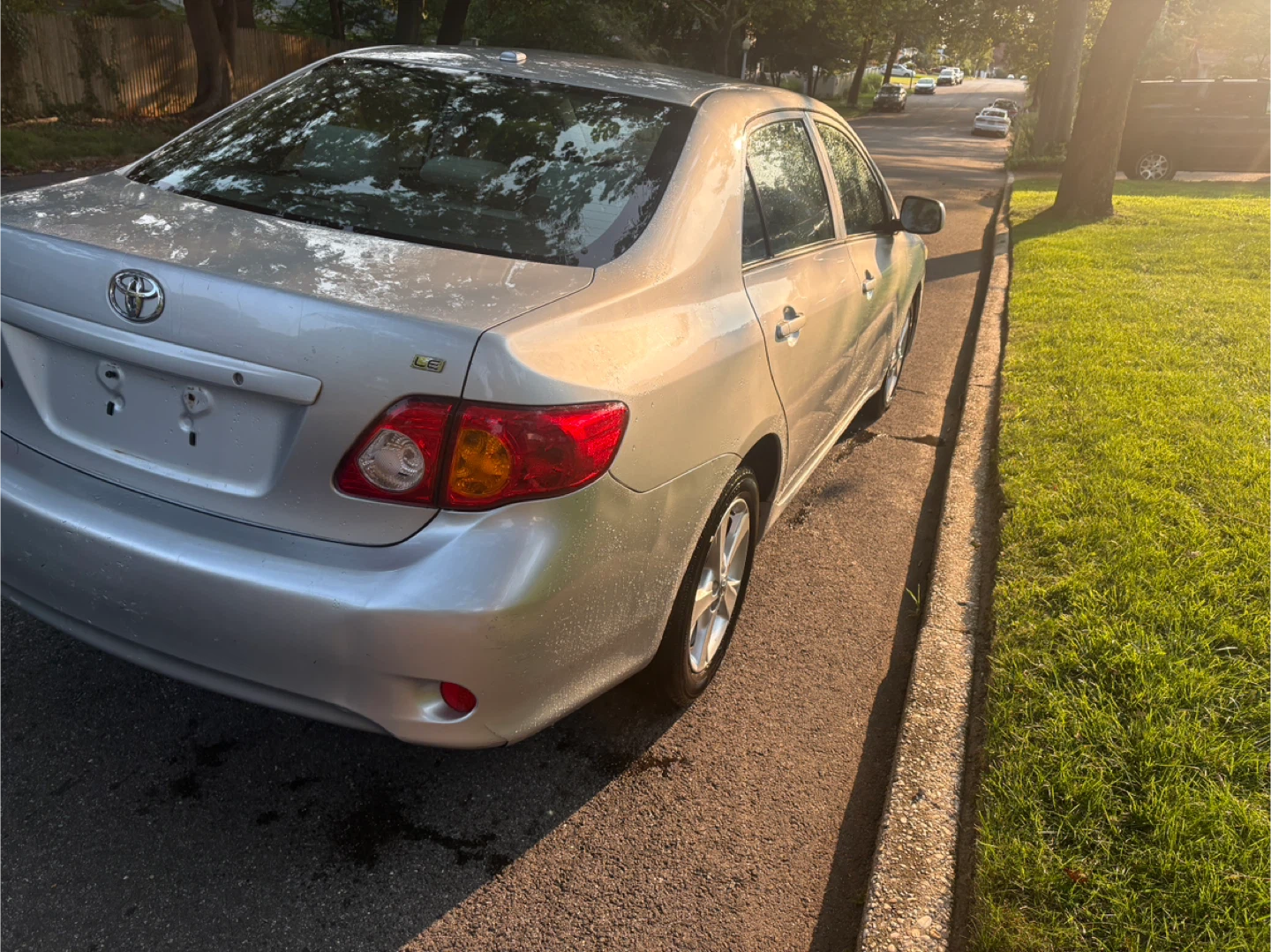Silver Toyota Corolla Sedan - photo 4