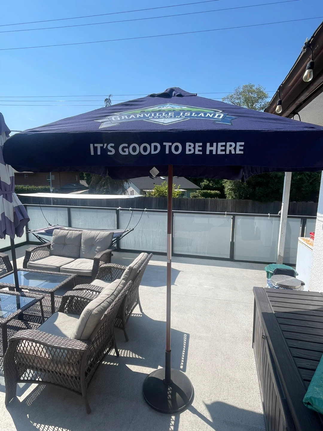Patio umbrella and base. Umbrella is brand new. Base is like new