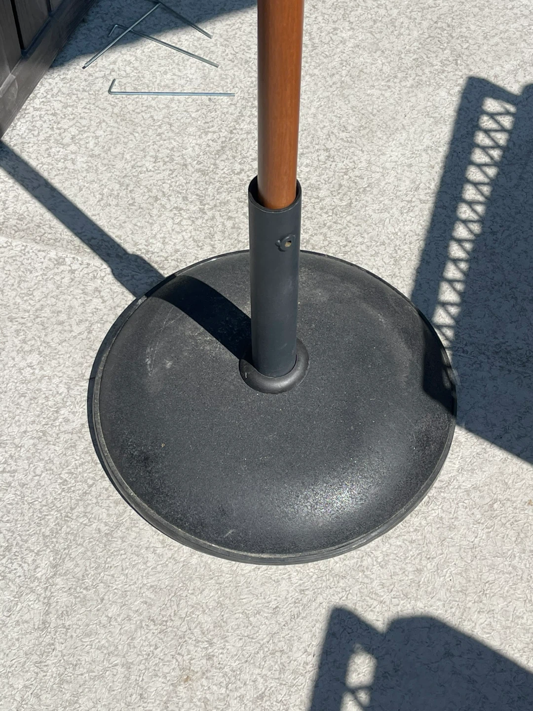 Patio umbrella and base. Umbrella is brand new. Base is like new - photo 2
