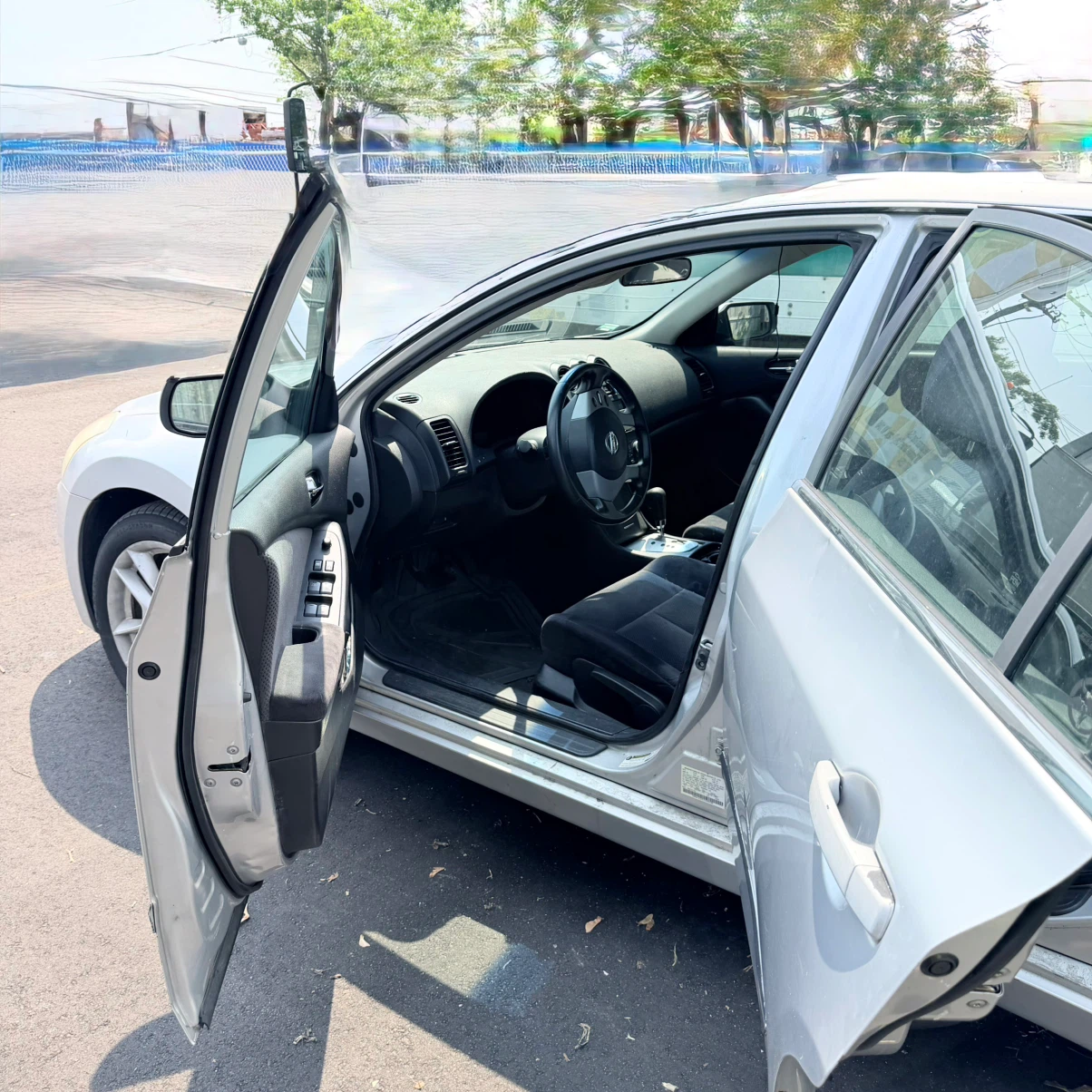 Silver Nissan Altima Sedan - photo 3