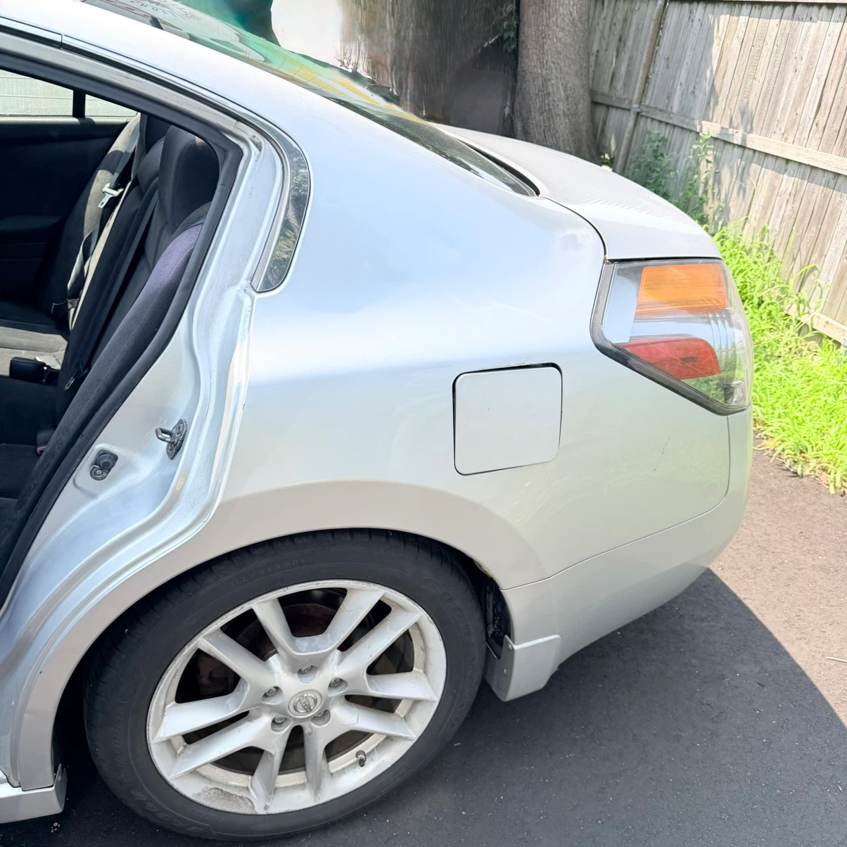 Silver Nissan Altima Sedan - photo 4