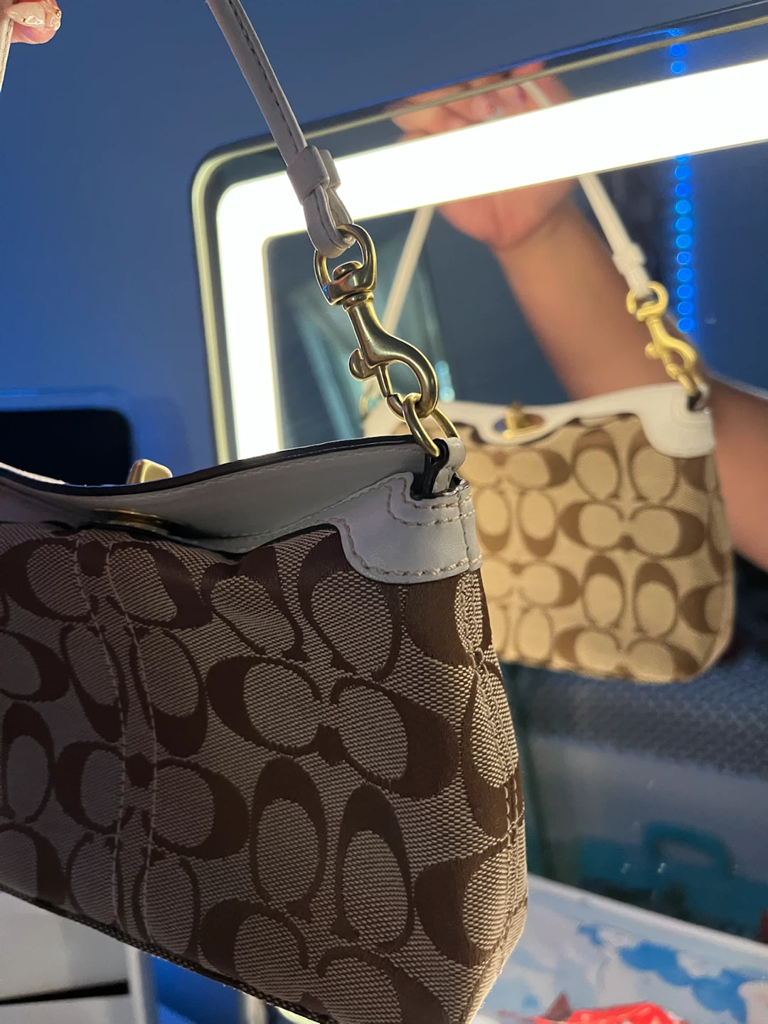 Coach Monogram mini turn lock bag