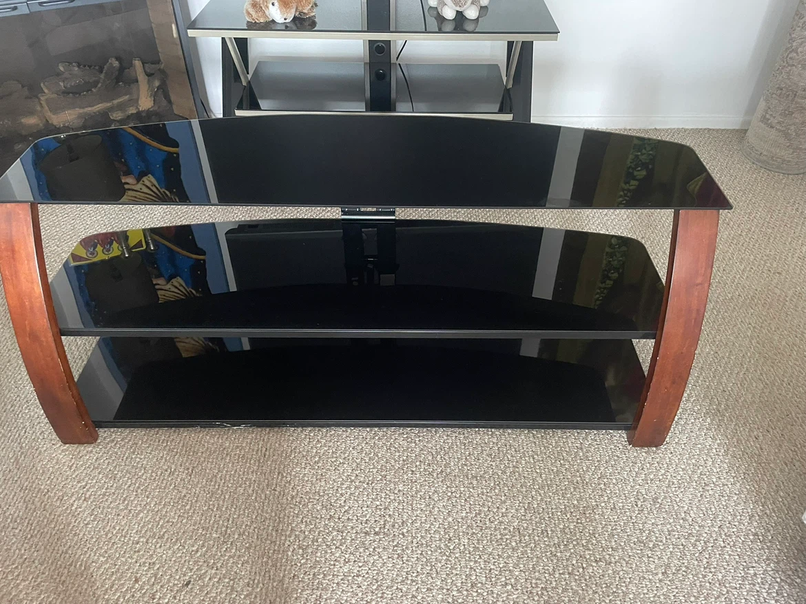 3-Shelf Black Glass TV Stand with Wood Accents