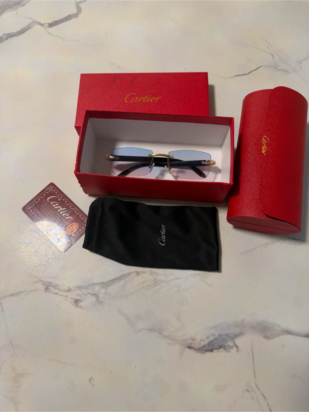 Cartier Rimless Sunglasses with Pink and Blue Gradient Lenses