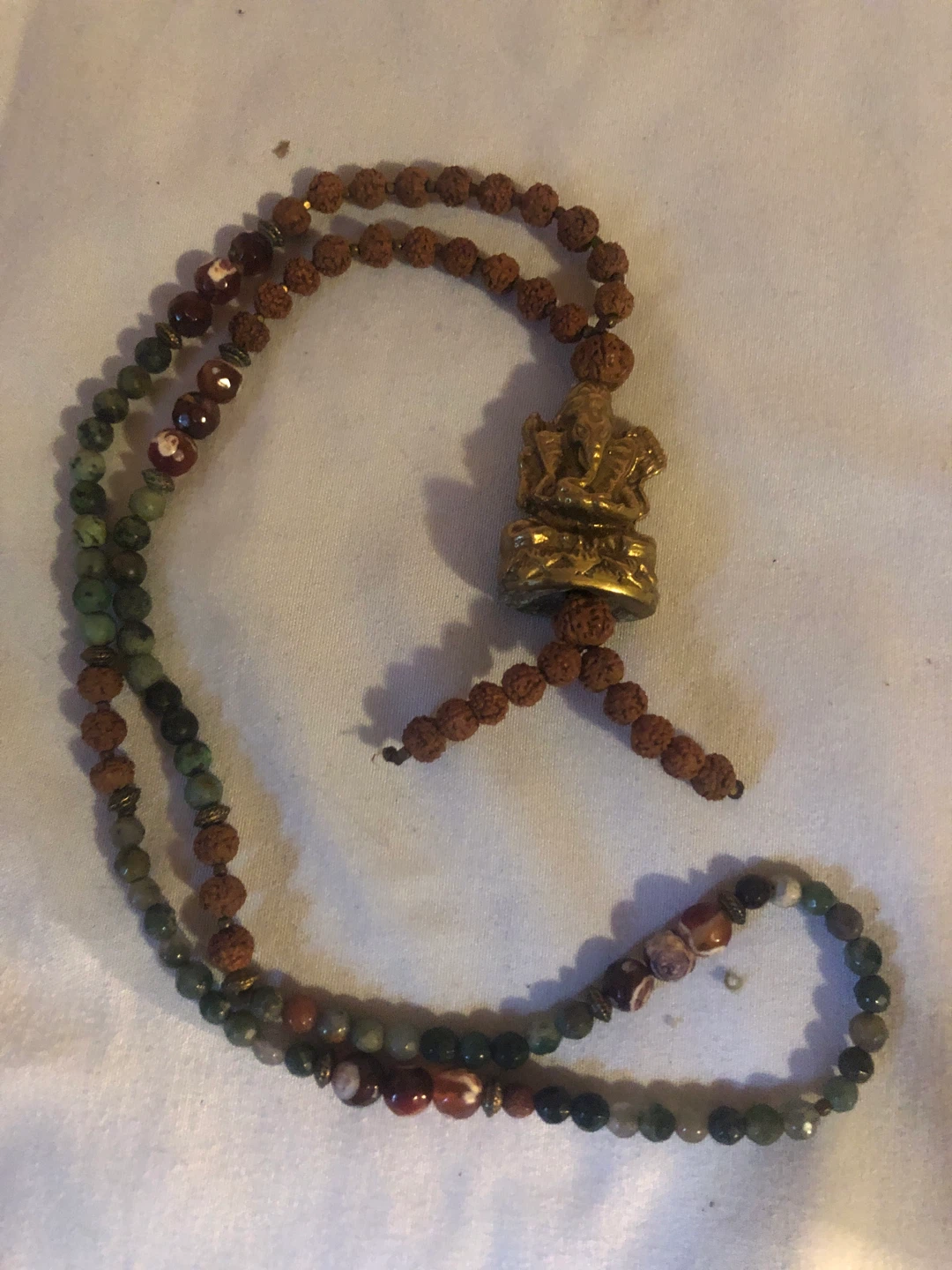 Rudraksha Mala with Ganesha Charm
