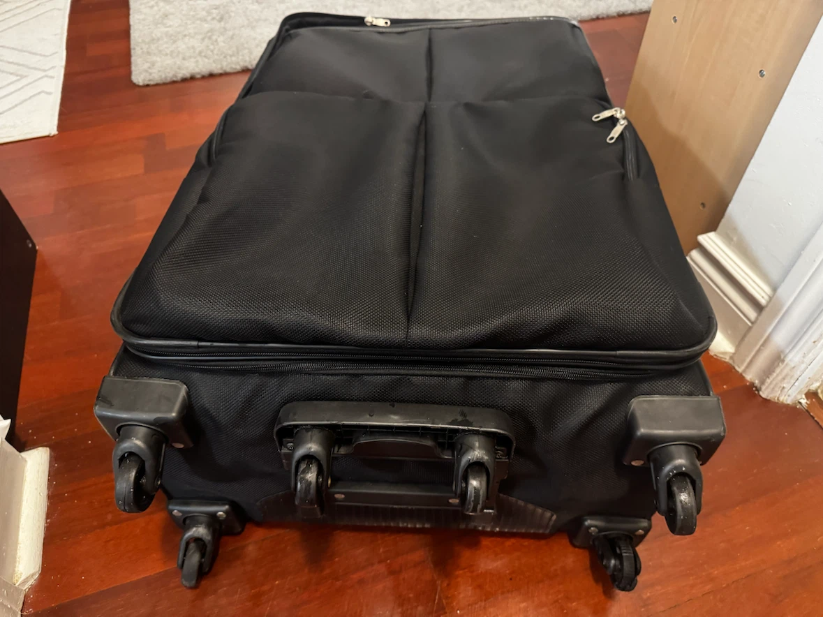 Large ELLE Black Softside Rolling Suitcase - photo 3