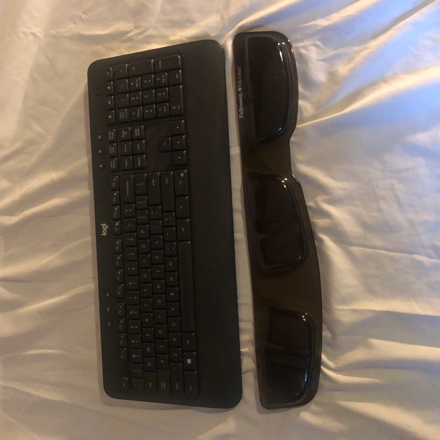 Logitech Keyboard and Fellowes Wrist Rest