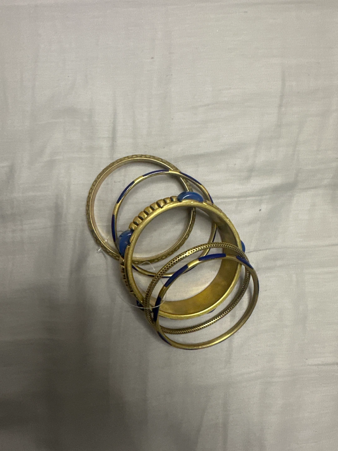 Set of 5 Gold Tone Bangles with Blue Inlay