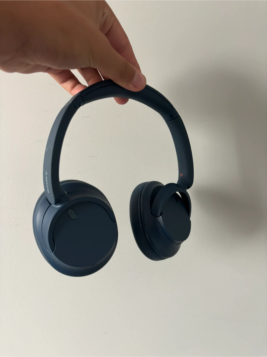 Sony WH-CH720N headphones and a protective case for them