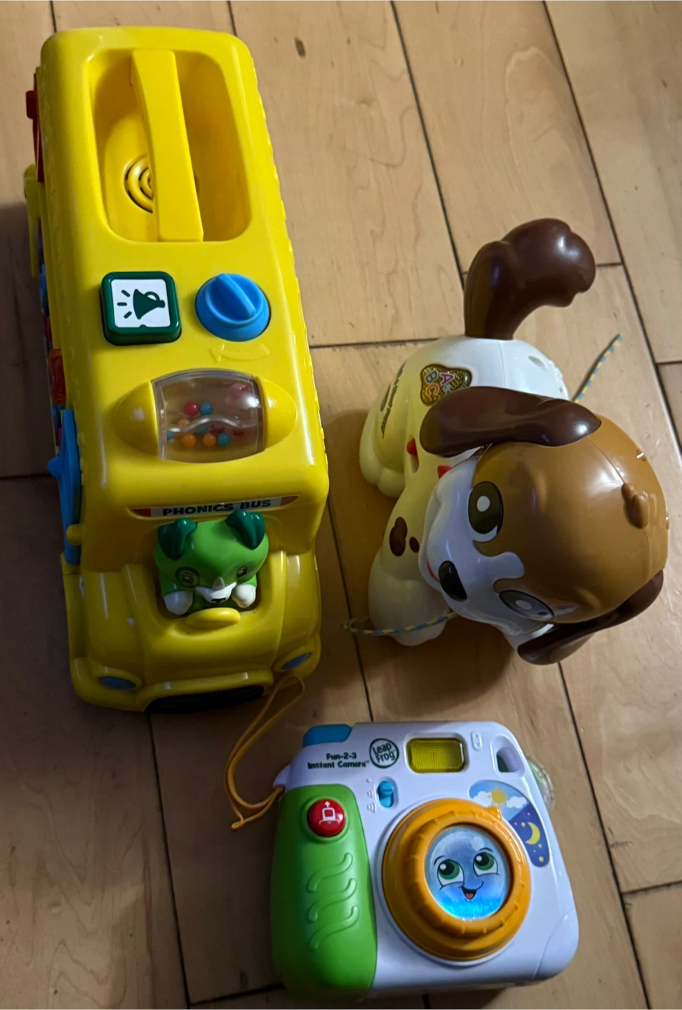 LeapFrog Phonics Bus, Fun-2-3 Instant Camera, and Pull Toy Dog