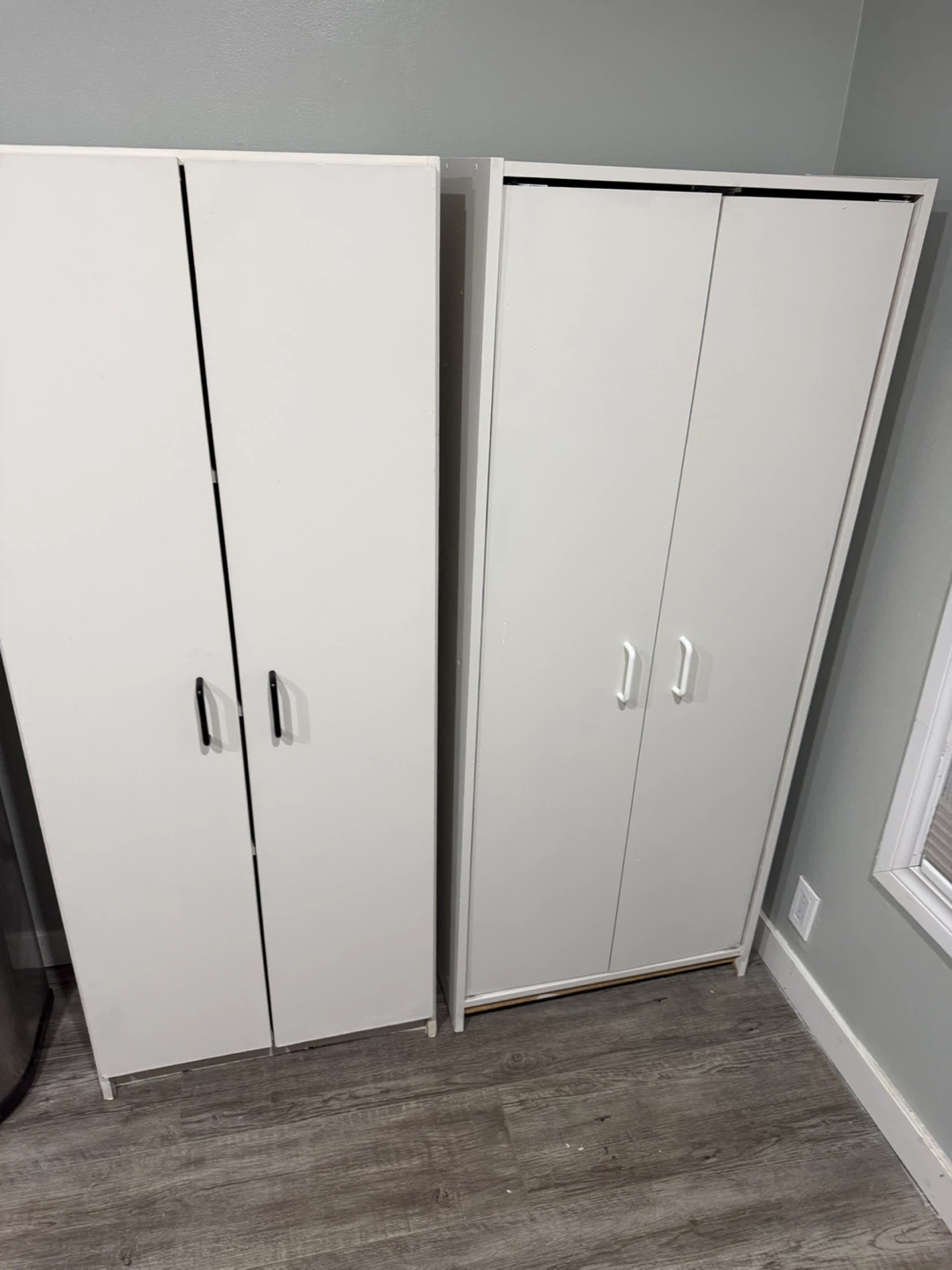 Two White Storage Cabinets