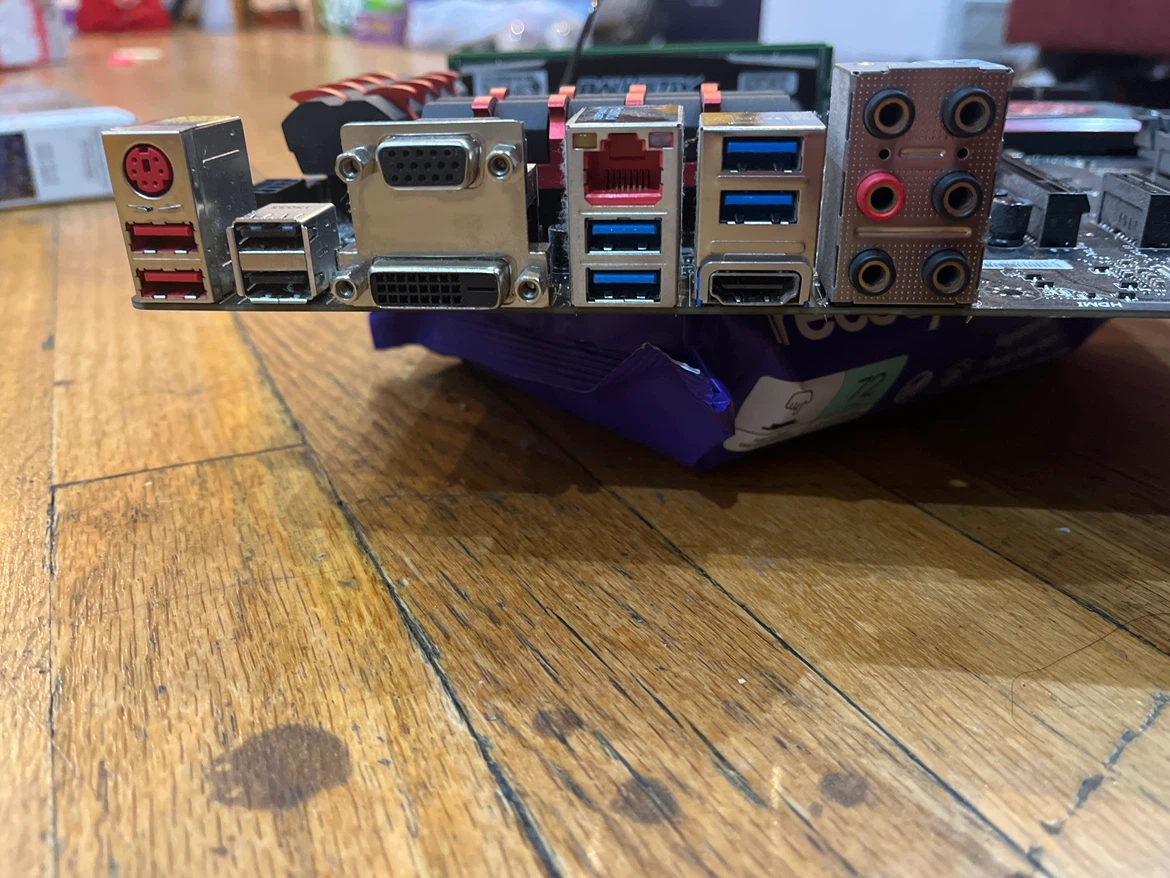 motherboard with cpu and two ram sticks - photo 2