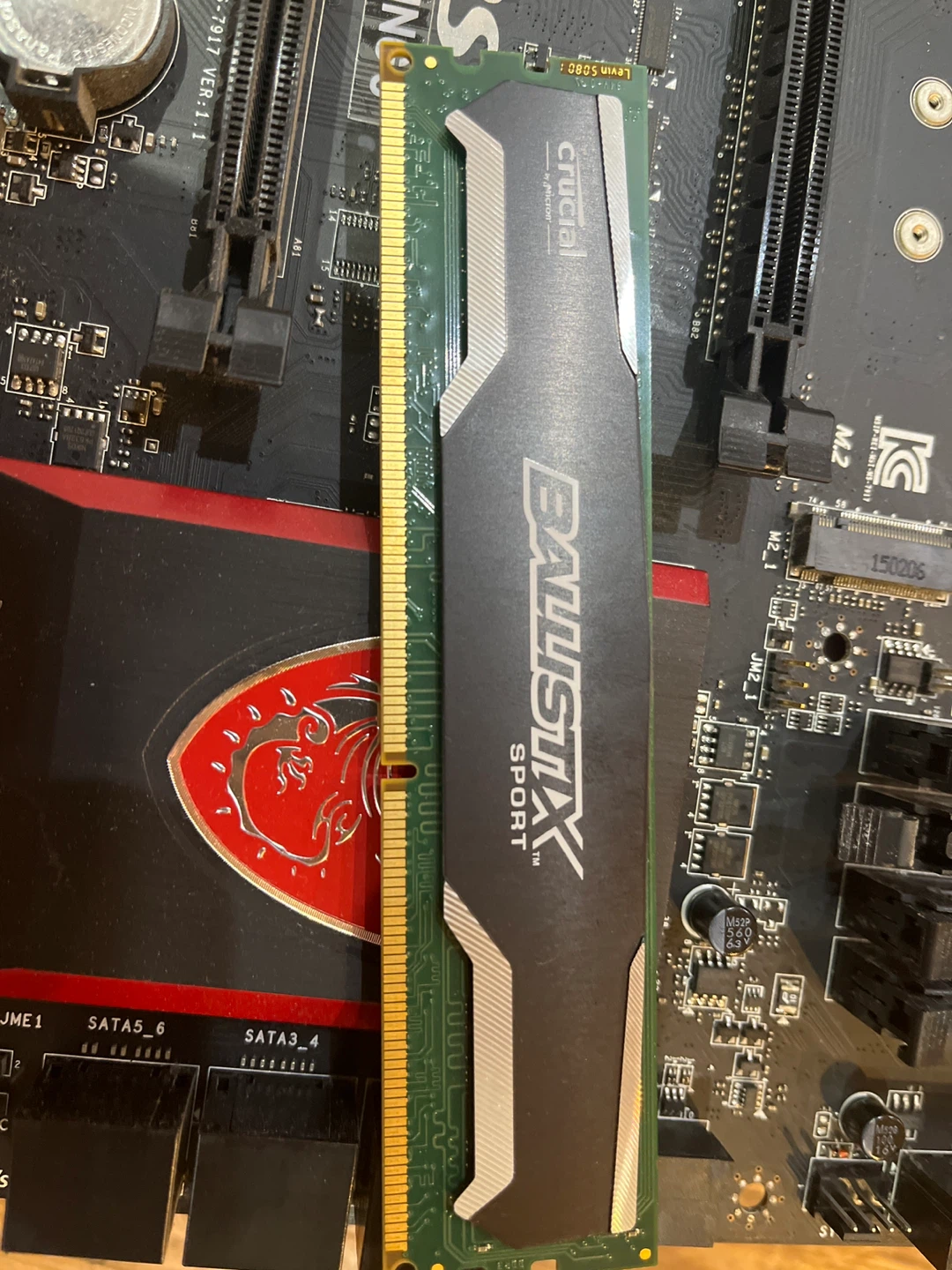 motherboard with cpu and two ram sticks - photo 5