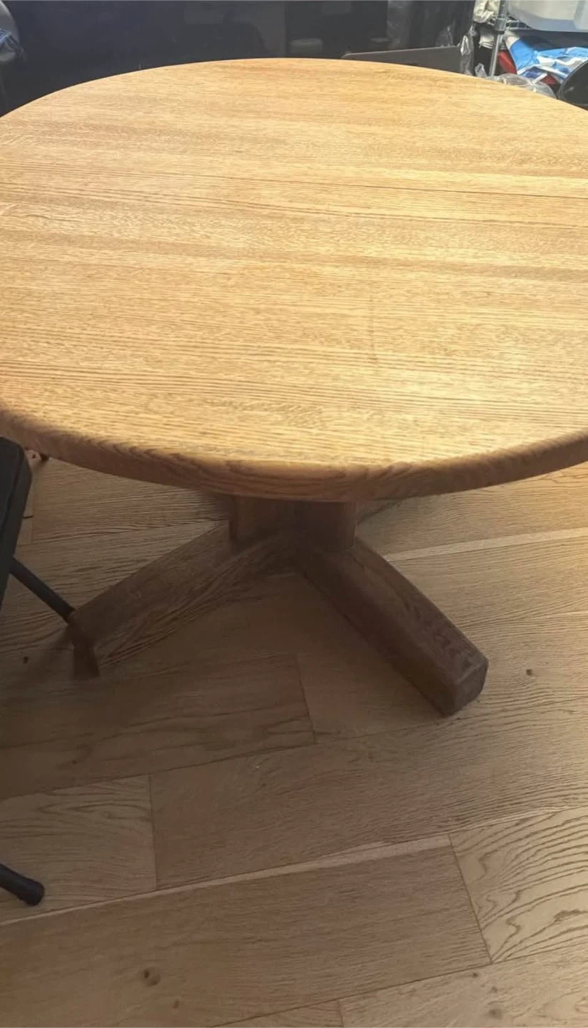 Extendable  oval solid wood dining table