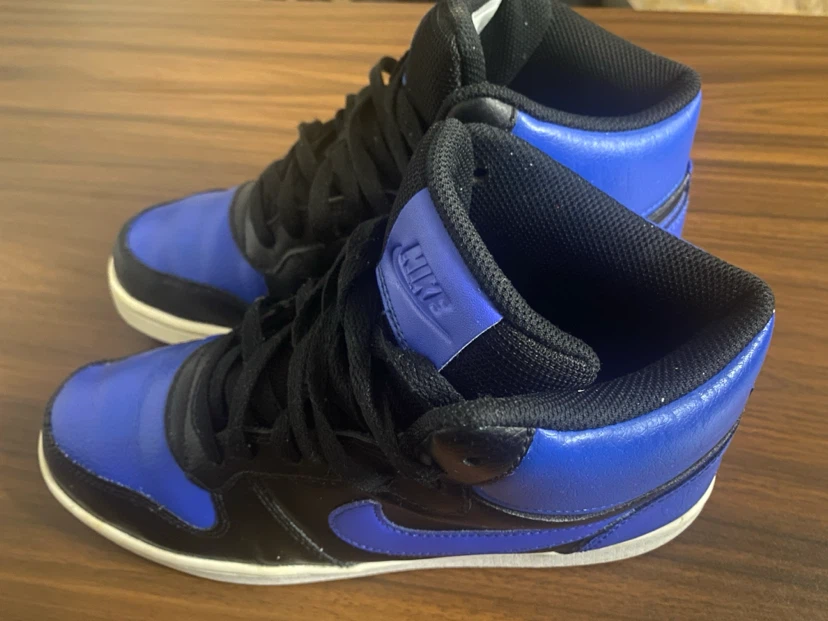 Bottes Nike bleues et noires pour jeunes - photo 2