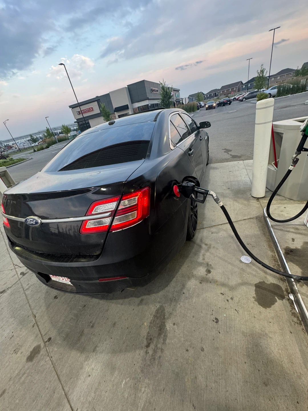 2013 Ford Taurus SEL black and beige