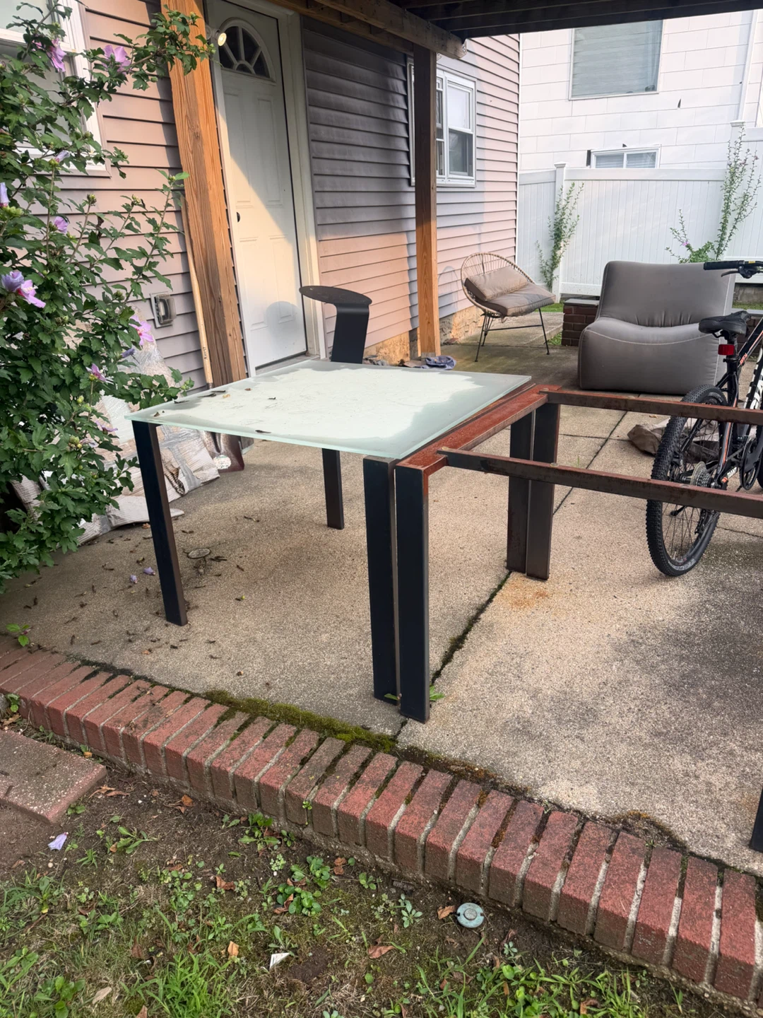 Glass top table with metal frame square dining tables