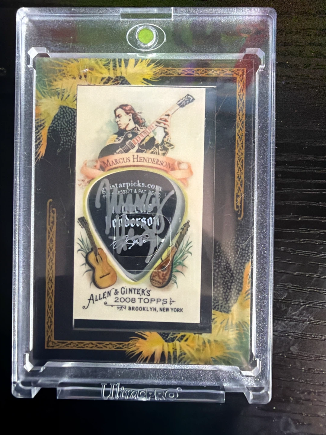 Guitar hero owner signed pick