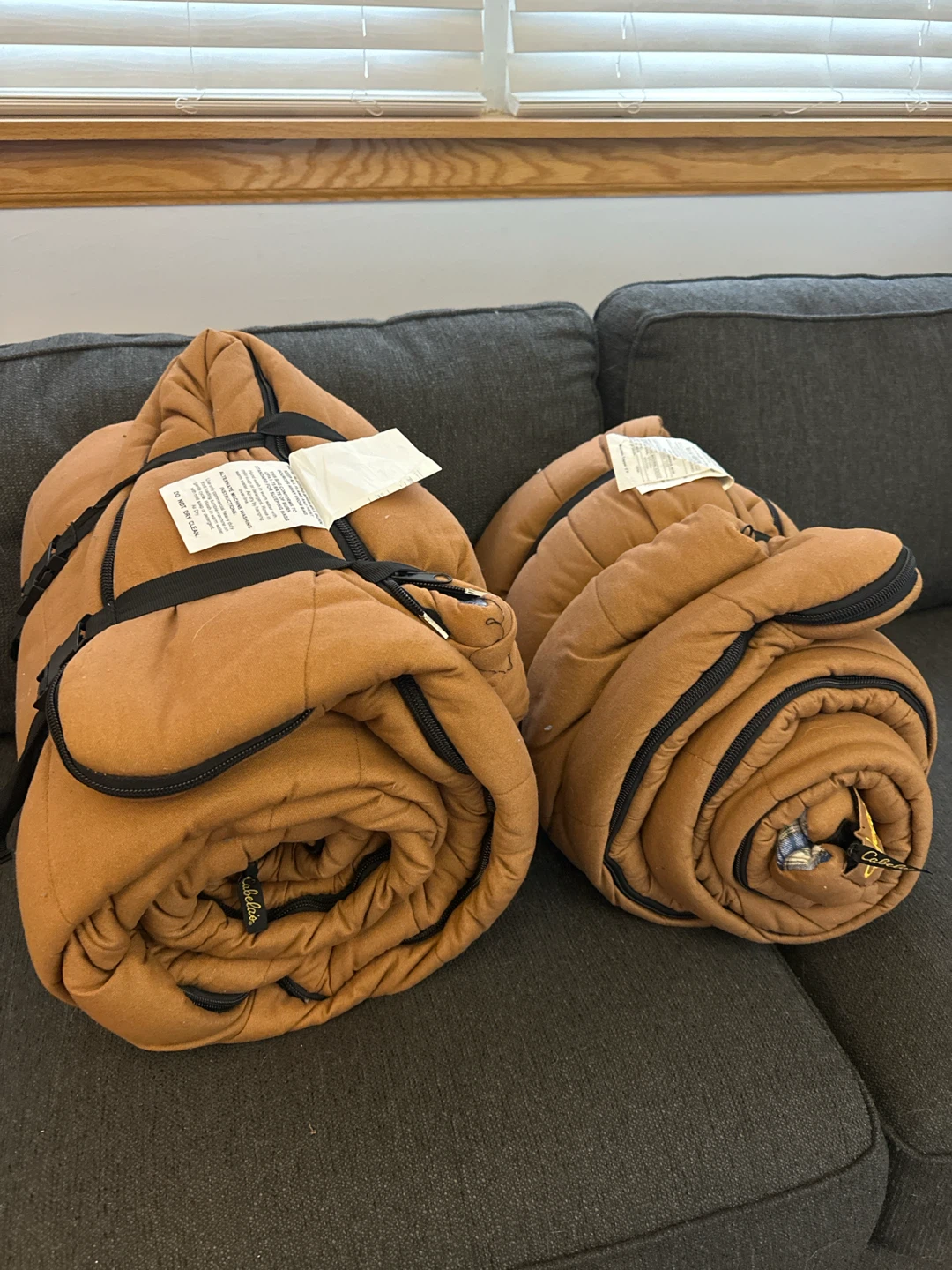 Two Cabela’s Mountain Trapper 0° sleeping bags.