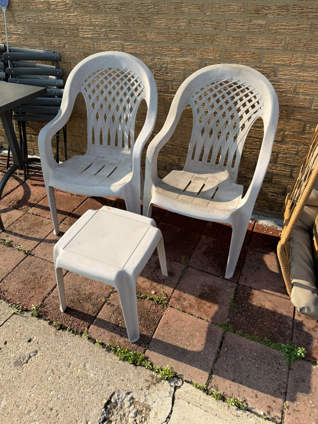 2 White Plastic Patio Chairs and Side Table Set