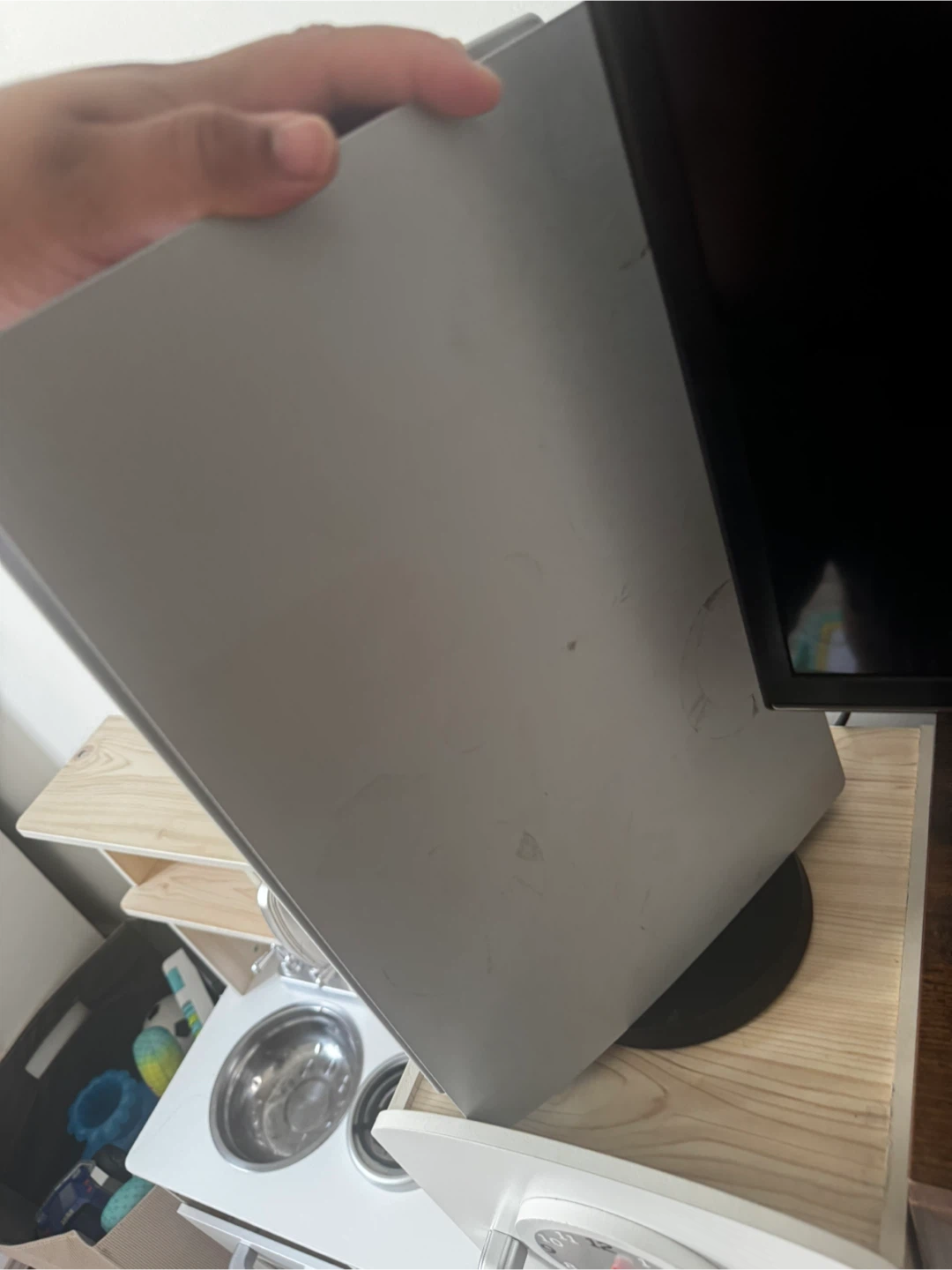 PlayStation 5 with a black and camo controller