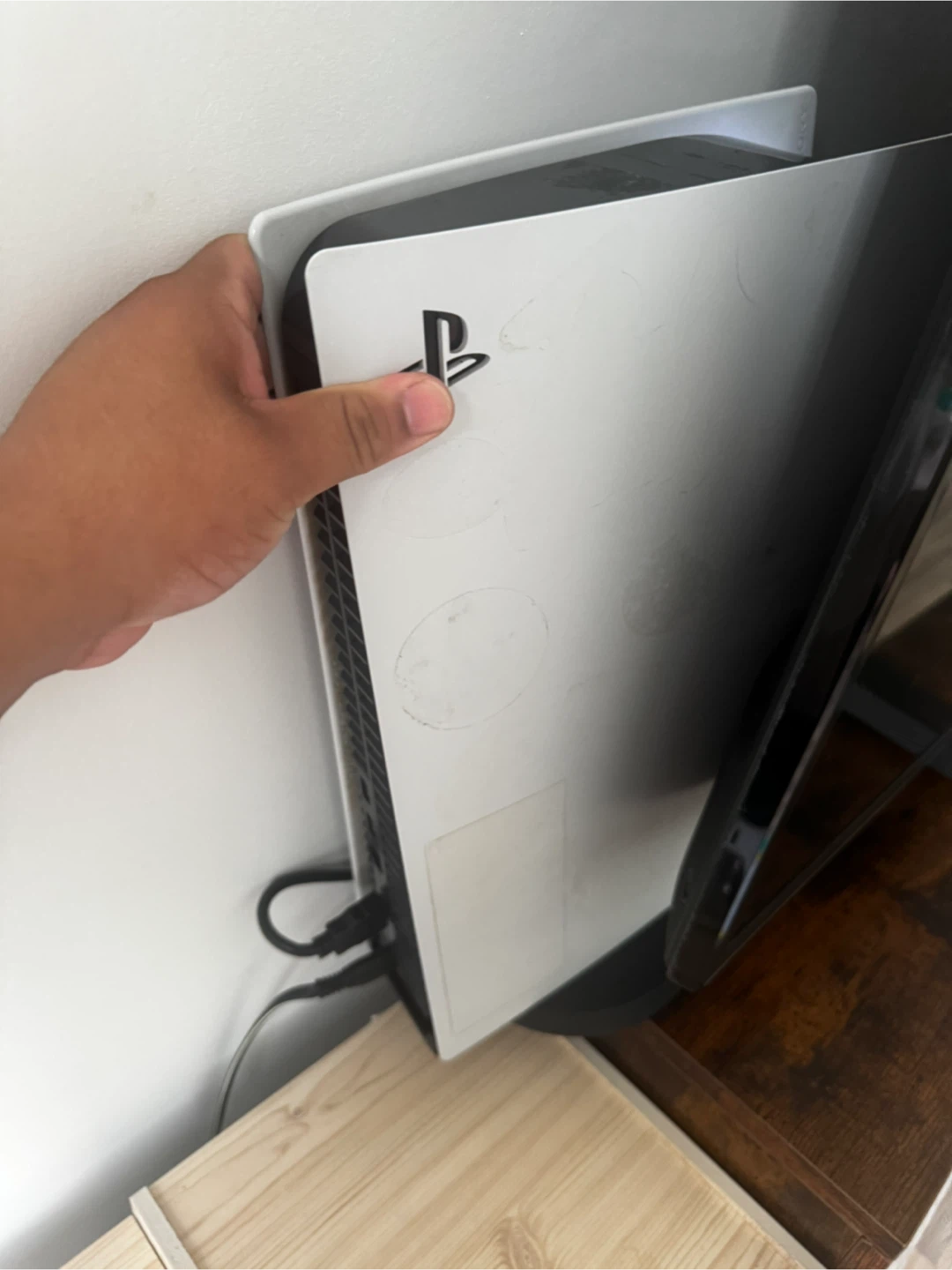 PlayStation 5 with a black and camo controller - photo 2