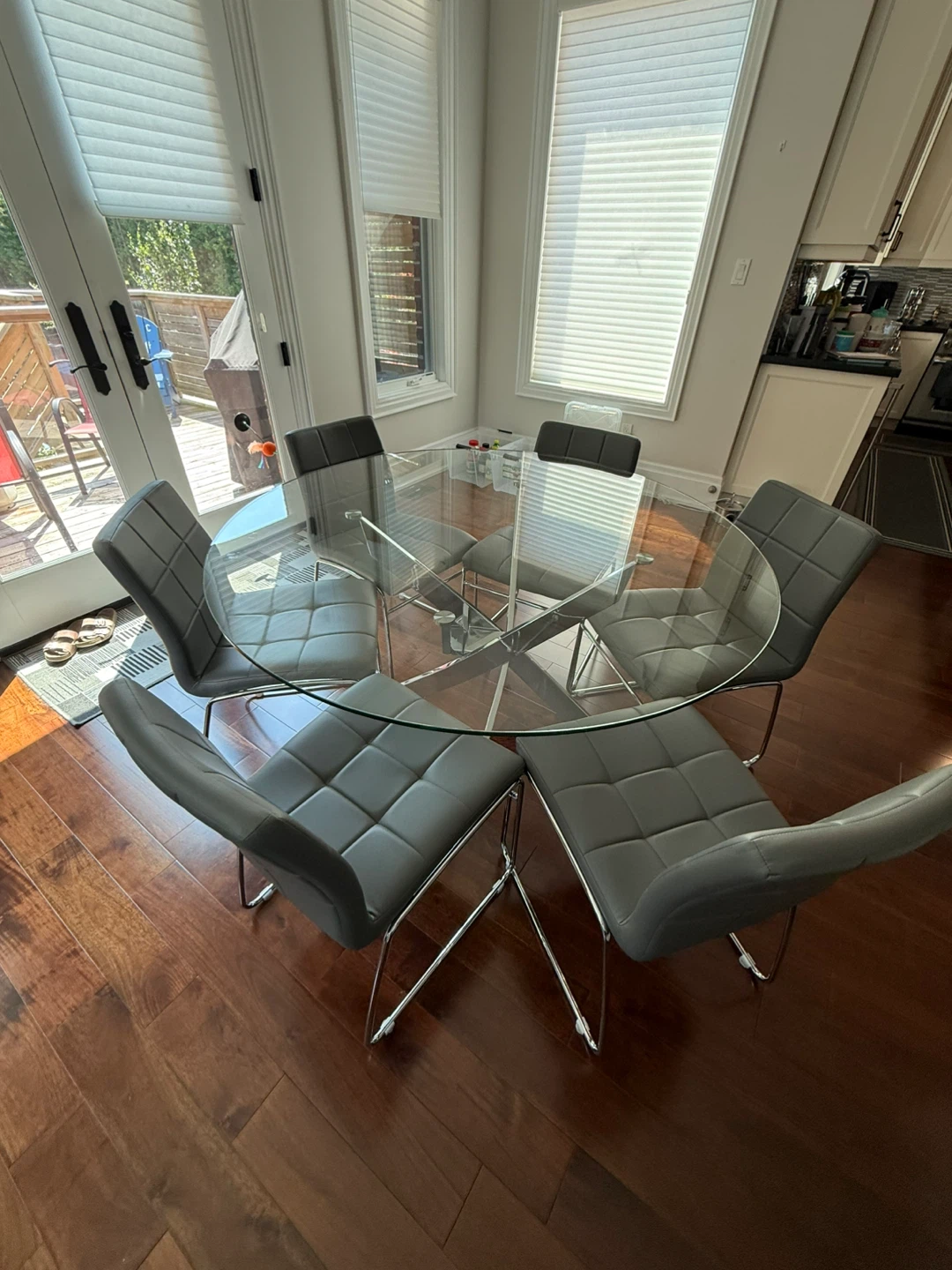 55” Round Glass Table with 6 Grey Chairs