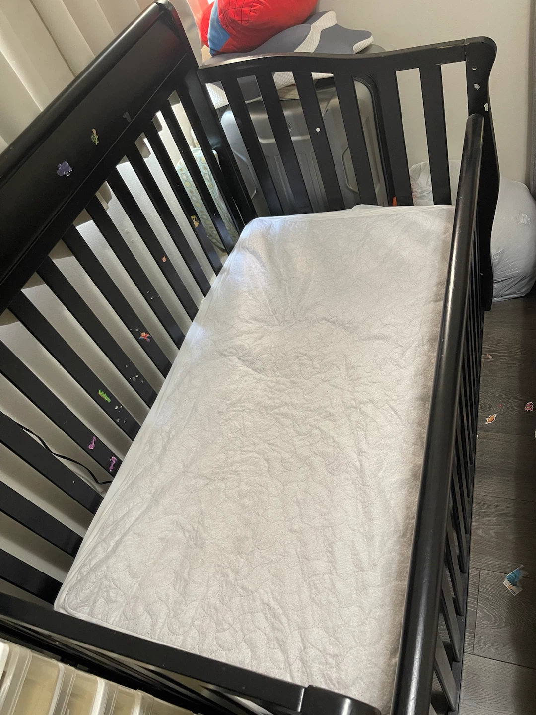 Black baby crib with mattress