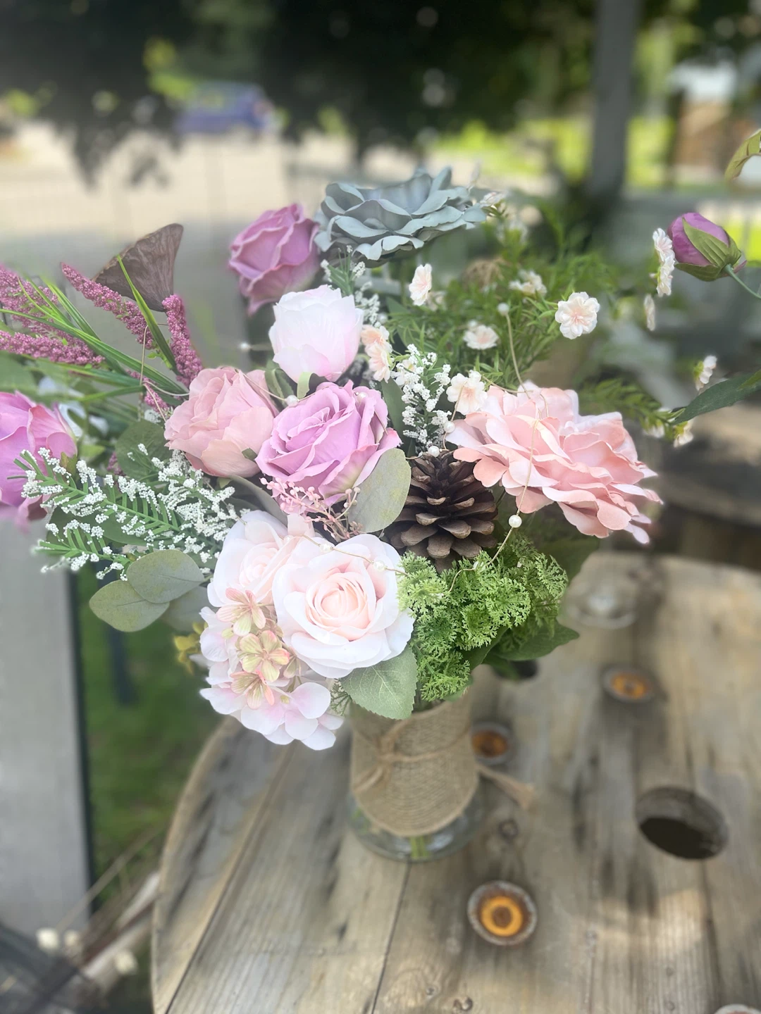 Artificial Flower Arrangement in Burlap Vase