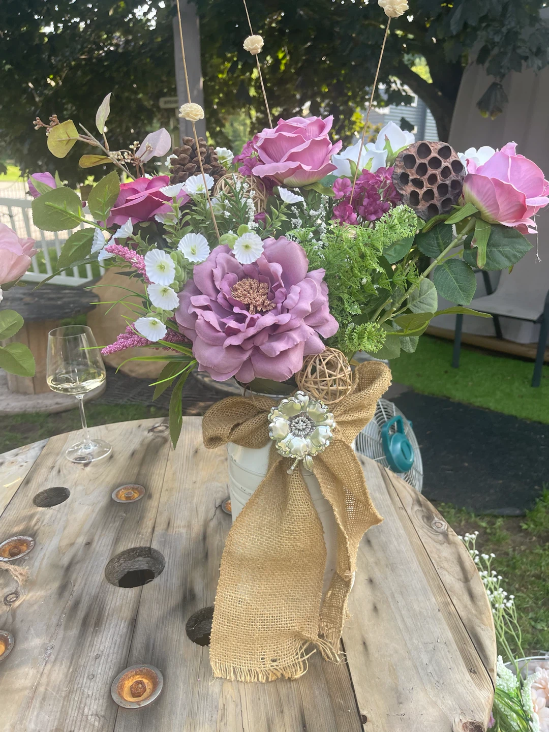 Artificial Flower Arrangement in White Milk Can Vase
