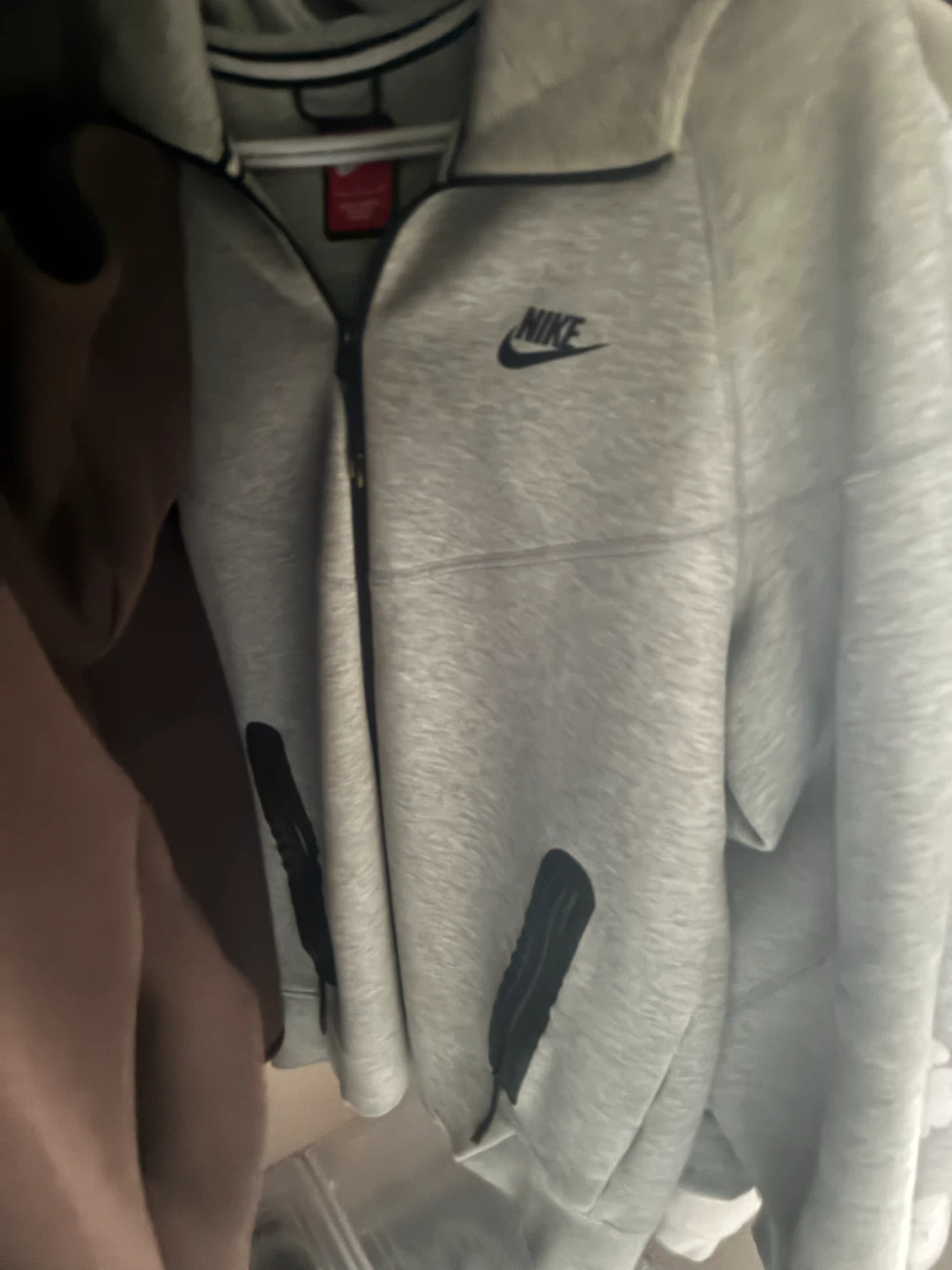 Brown and grey Nike tech
