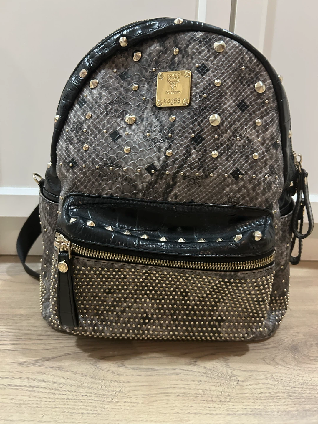 MCM Studded Snakeskin Backpack