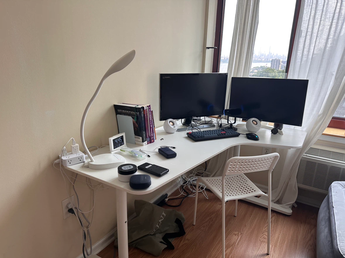 Ikea desk and chair, and lamp