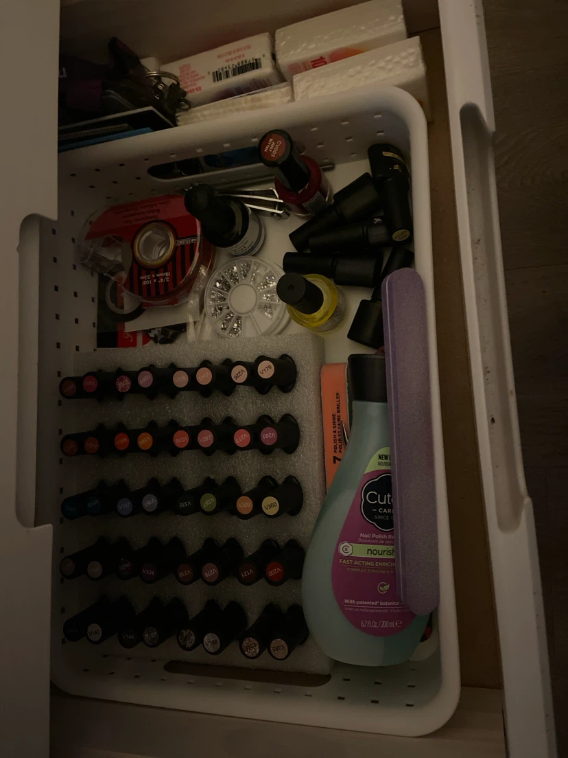Collection of Nail Polishes and Nail Care Supplies
