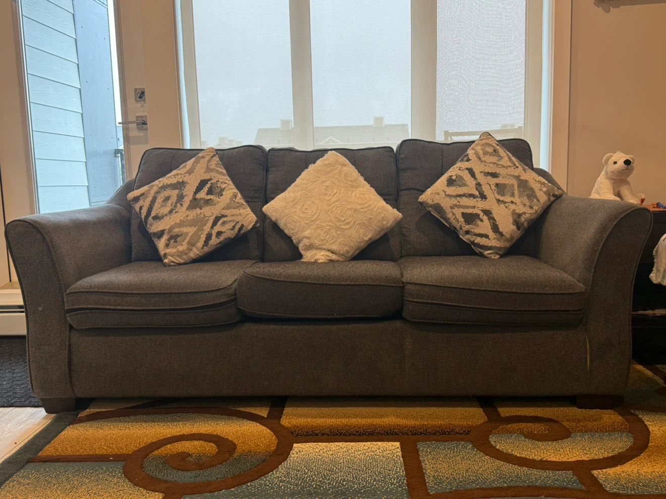 Dark Grey Sofa with Accent Pillows