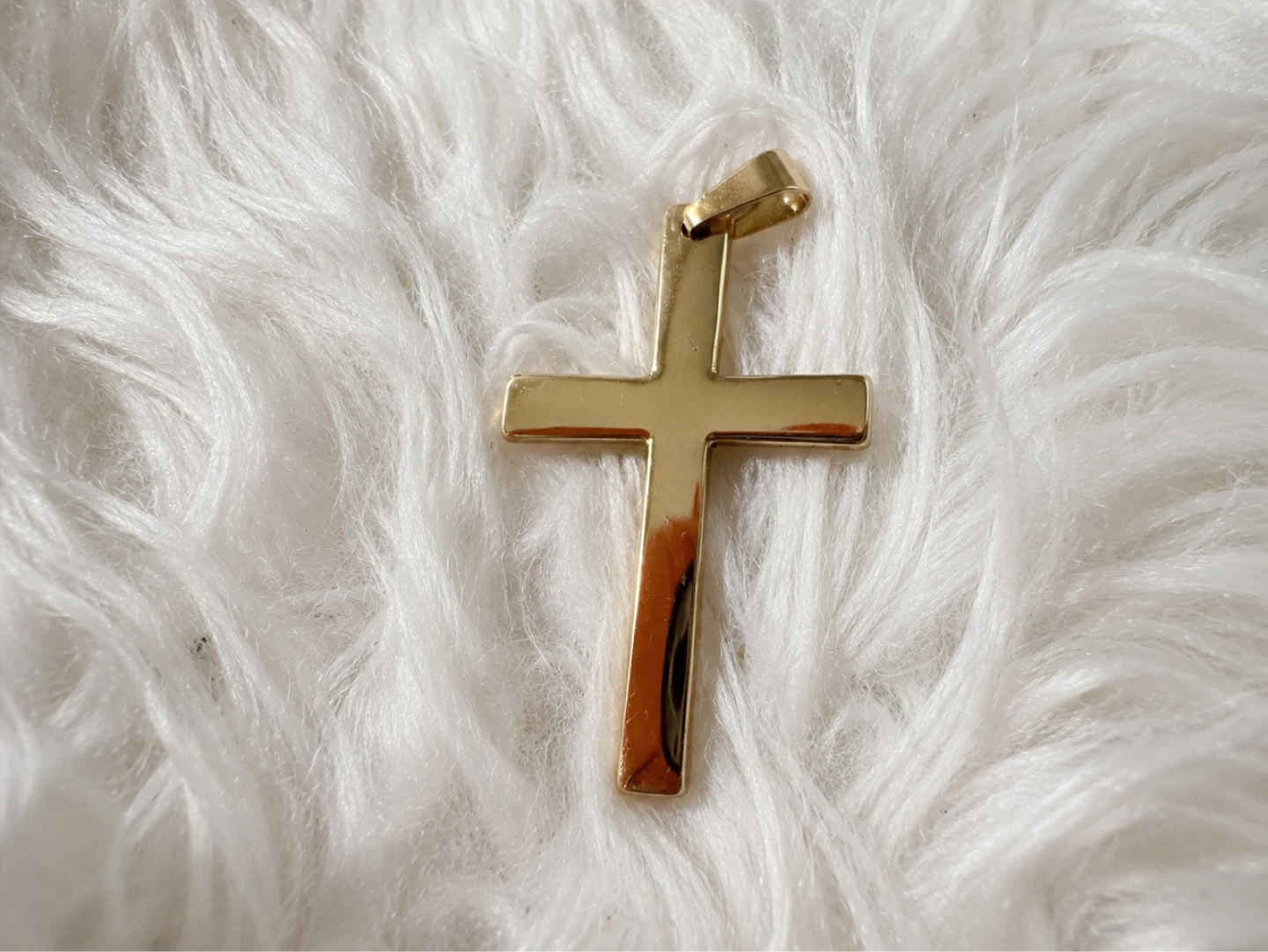 Gold coloured cross pendant