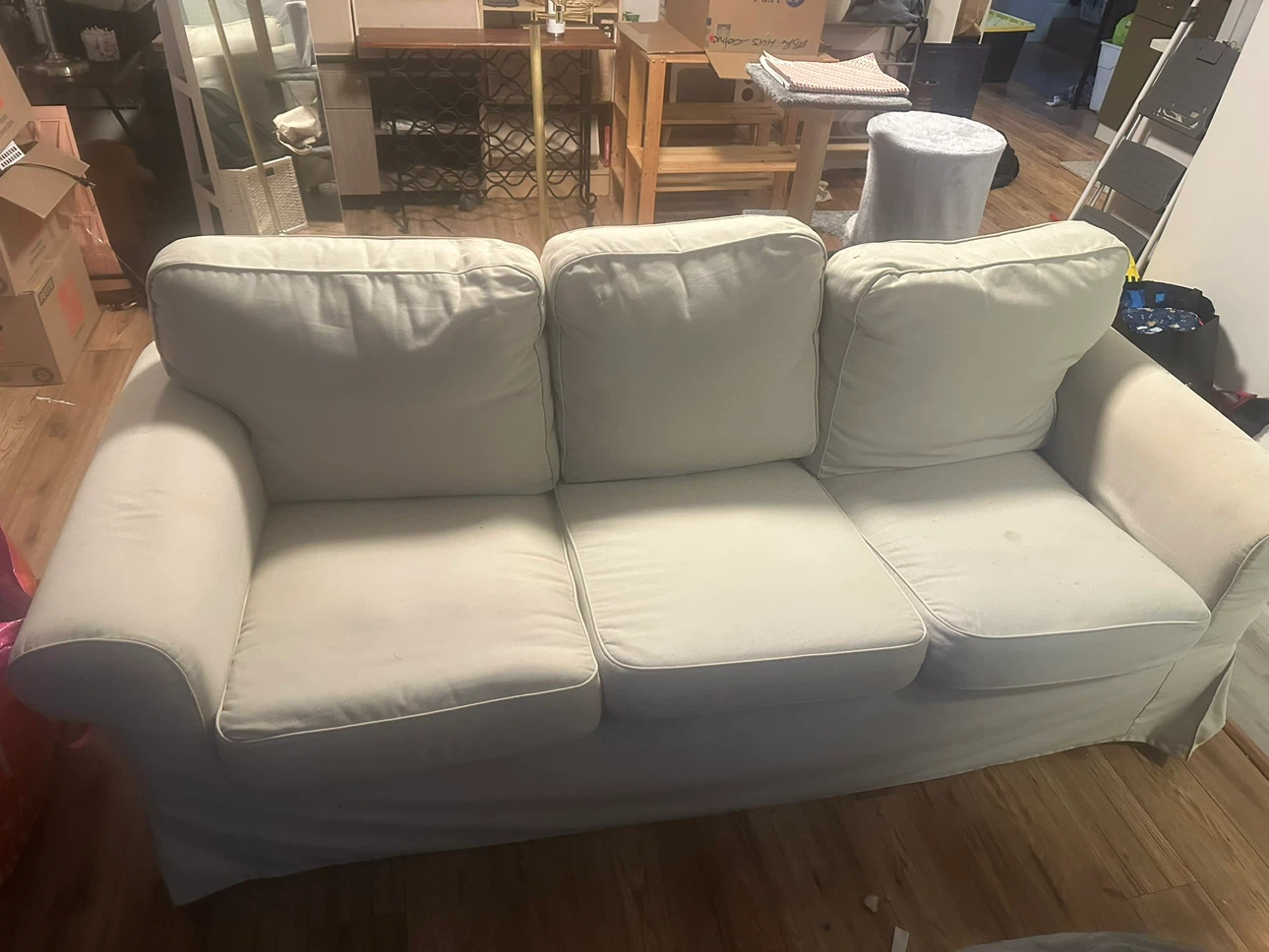Cream coloured 3-seater sofa