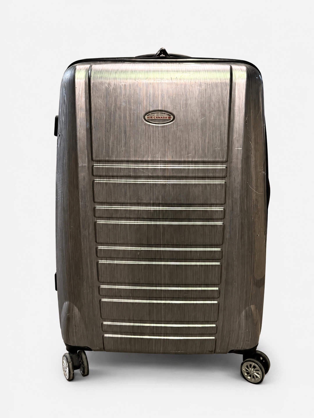 Large Air Canada hardshell suitcase in silver/grey.